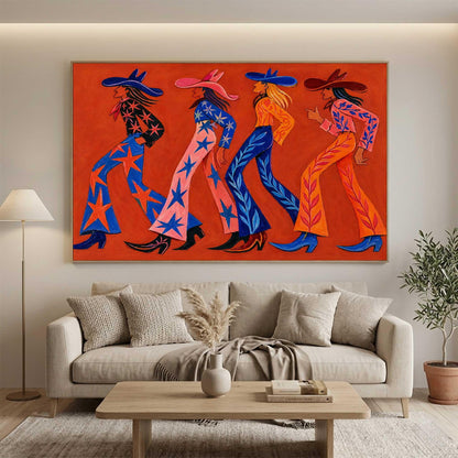 May include: A large rectangular wall art piece featuring four figures walking in profile against a solid orange background. Each figure wears a wide-brimmed hat and patterned trousers with star or leaf motifs, rendered in vibrant shades of blue, pink, and orange.