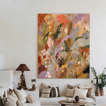 May include: A large rectangular canvas painting featuring an abstract floral composition with thick, textured brushstrokes in shades of burnt orange, mustard yellow, sage green, soft lavender, and cream, displayed on a plain white wall.