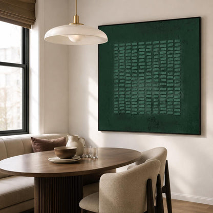 May include: A large square wall art piece featuring a deep forest green background with a central grid of raised, rectangular textured blocks in a matching green hue, all enclosed within a thin, simple black frame.