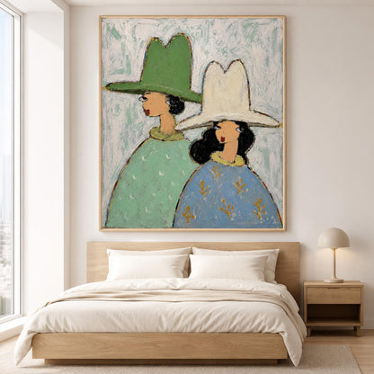 May include: A framed oil painting featuring two figures in profile wearing wide-brimmed hats. The figure on the left wears a green hat and a light green patterned garment. The figure on the right wears a white hat and a blue garment with gold accents.