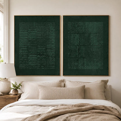May include: Two rectangular wall art pieces in a deep forest green hue, each framed in a thin gold border. The artwork features a textured, raised pattern of vertical and horizontal lines arranged in a grid-like formation across the dark surface.