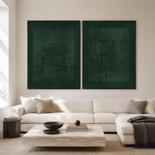 May include: Two large rectangular wall art pieces featuring a deep forest green color with a textured, grid-like pattern of horizontal and vertical lines. Each piece is enclosed in a thin black frame, displaying a dark, matte finish.