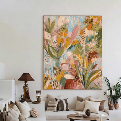 May include: A large rectangular canvas painting featuring an abstract botanical composition with thick, textured brushstrokes in shades of sage green, mustard yellow, soft pink, sky blue, and deep terracotta, accented by small dark brown dots.
