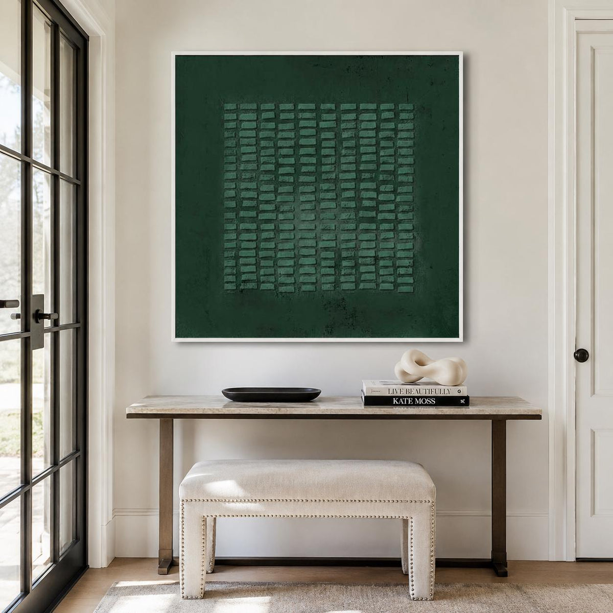 May include: A square wall art piece featuring a deep forest green background with a central grid of raised, rectangular textured blocks in a lighter shade of green, all enclosed within a thin, clean white frame mounted on a neutral wall.