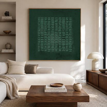 May include: A large square wall art piece featuring a deep forest green background with a central grid of raised, textured rectangular blocks in a lighter shade of green, all enclosed within a thin, light-colored wooden frame.