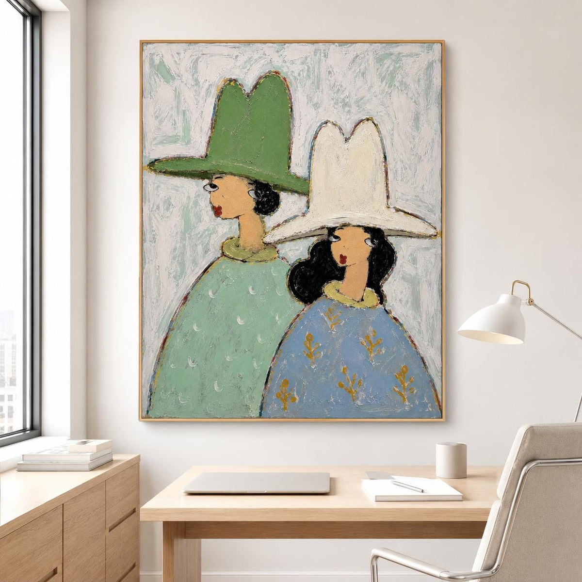 May include: A framed painting depicting two figures wearing wide-brimmed hats. The figure on the left wears a green hat and a light green patterned garment. The figure on the right wears a white hat and a blue garment with gold leaf-like accents.