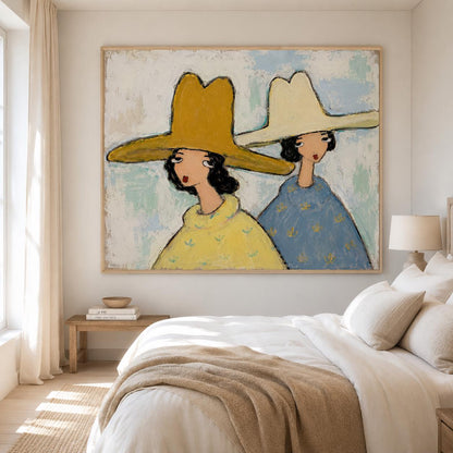 May include: A large rectangular wall painting featuring two stylized figures wearing wide-brimmed hats. The figure on the left wears a mustard yellow hat and sweater, while the figure on the right wears a cream hat and a blue patterned sweater.