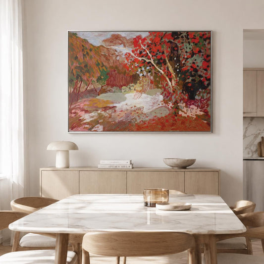 May include: A large rectangular framed painting hanging on a wall, depicting an impressionistic landscape with vibrant red foliage, earthy brown hills, and a pale central area, rendered in thick, textured brushstrokes with a rich color palette.
