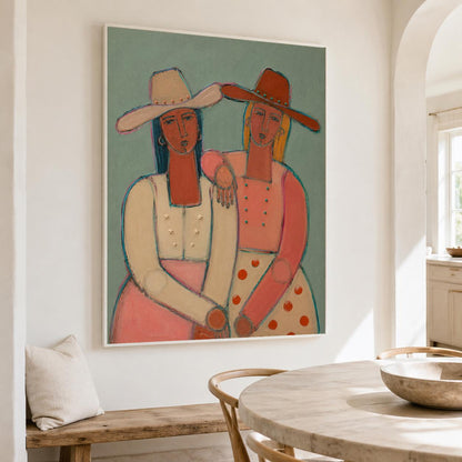 May include: A square wall art print featuring a stylized painting of two figures wearing wide-brimmed hats. The figure on the left wears a cream top with star accents and a pink skirt. The figure on the right wears a coral top and a polka-dot skirt.