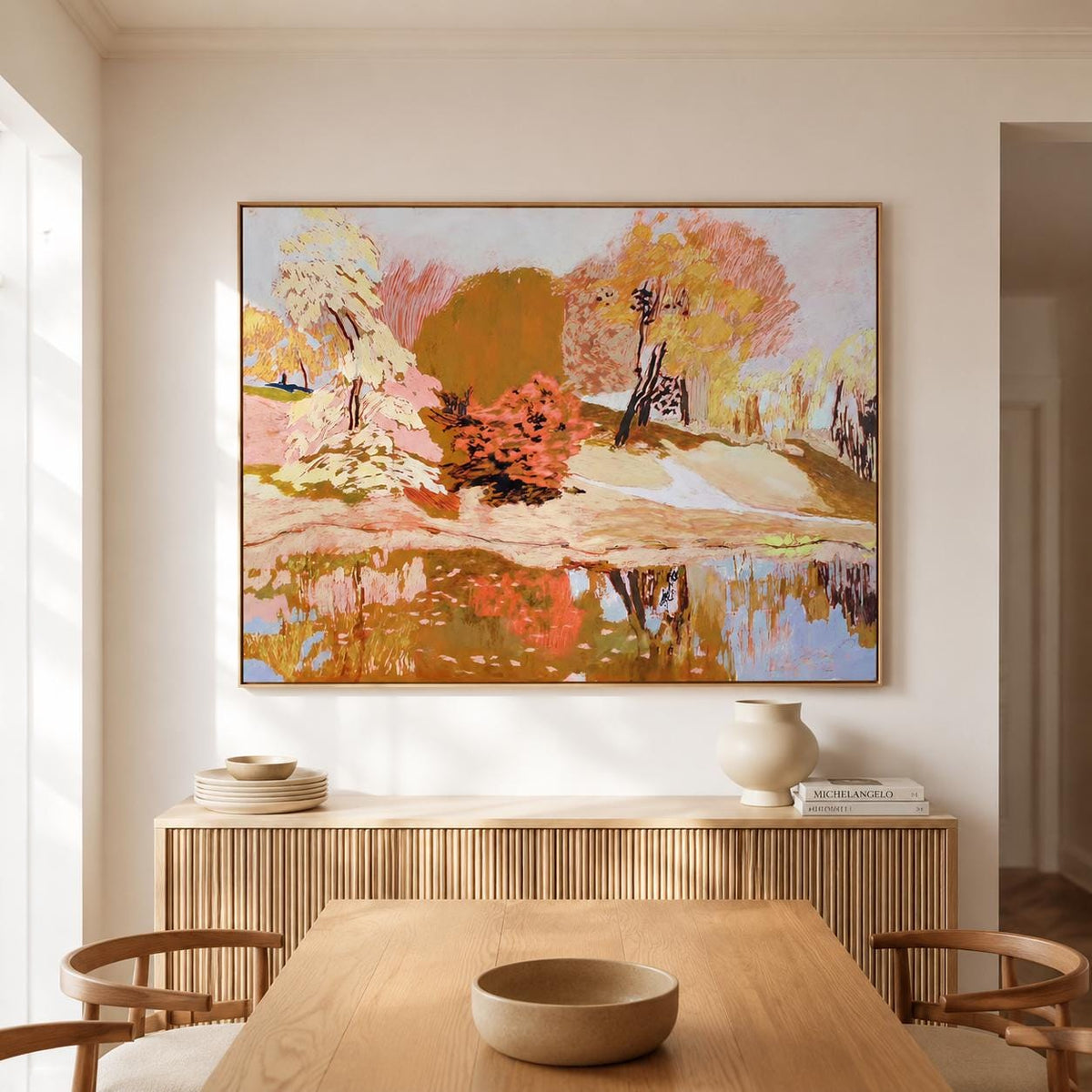 May include: A large rectangular landscape painting featuring a stylized forest scene with trees in shades of cream, orange, and deep brown. The artwork depicts a reflection of the foliage in a body of water below, rendered with visible brushstrokes.