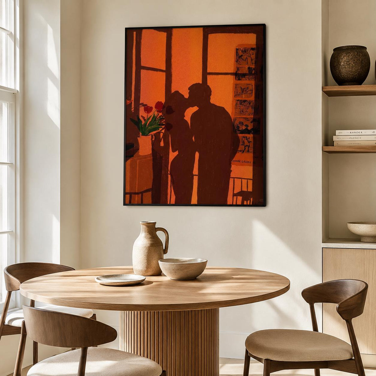 May include: A framed wall art print featuring a dark silhouette of two figures kissing against a vibrant orange background. The artwork depicts a window scene with a vase of red flowers on a ledge and a vertical strip of small illustrations on the right.