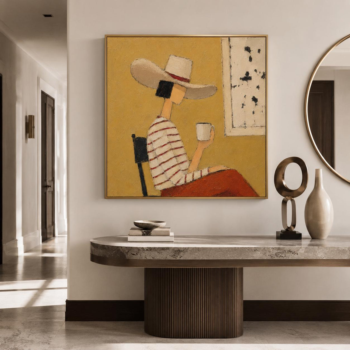 May include: A square framed painting depicting a person wearing a wide-brimmed hat and a striped long-sleeve shirt, sitting on a chair while holding a white mug. The background is a solid mustard yellow with a white rectangular panel on the right.
