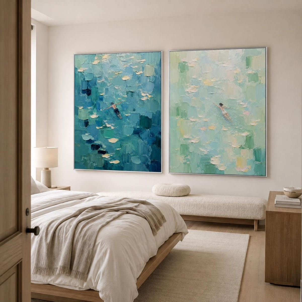 May include: Two large rectangular canvas paintings hanging side by side on a wall. The left painting features deep blue and teal impasto brushstrokes with a small figure swimming. The right painting shows light green and white tones with a swimmer.