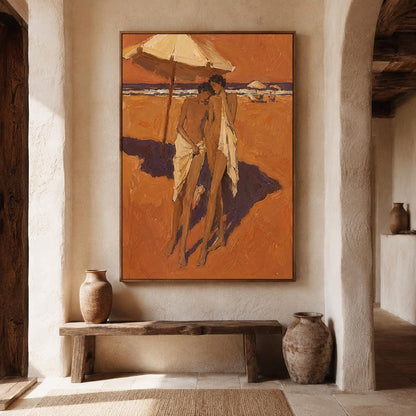 May include: A rectangular framed oil painting depicting two figures standing on a sandy beach under a large umbrella. The artwork features warm orange and brown tones, with the figures draped in white fabric against a deep blue ocean horizon.