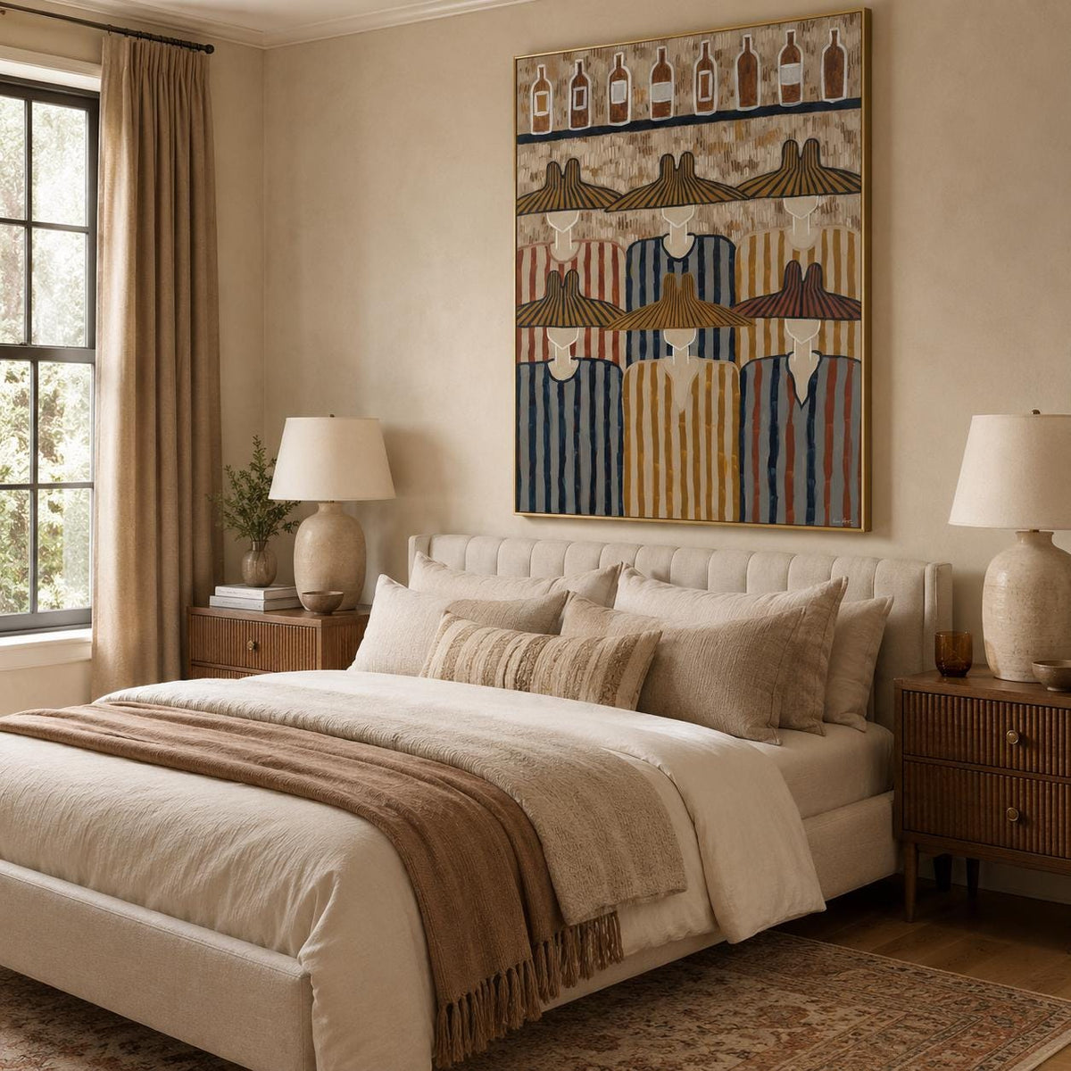May include: A large rectangular framed painting hanging above a bed, depicting six figures wearing wide-brimmed hats and striped shirts, with a row of eight bottles illustrated on a shelf at the top of the artwork in shades of blue, brown, and gold.