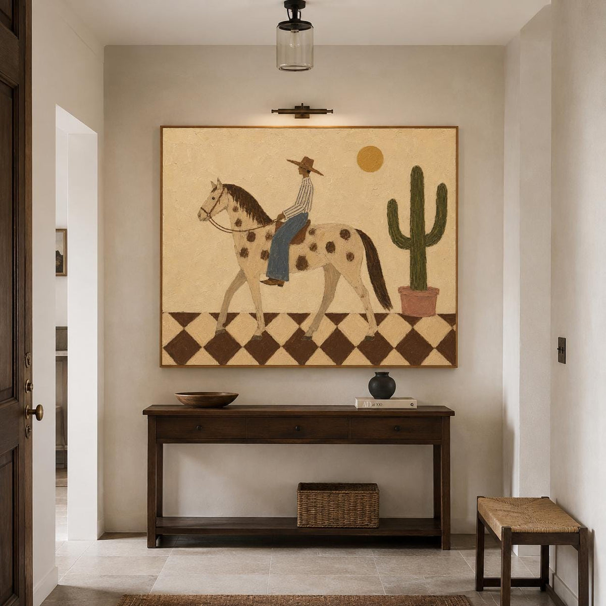 May include: A rectangular wall art piece featuring a painting of a person in a hat riding a spotted horse across a checkered floor. A tall green cactus in a pot stands to the right, and a yellow sun is positioned in the upper right corner.
