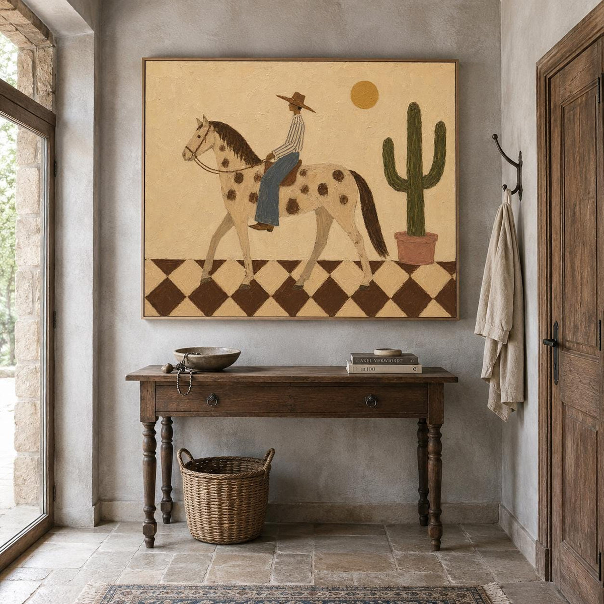 May include: A framed rectangular wall art print featuring a stylized illustration of a person in a hat riding a spotted horse across a brown and cream checkered floor. A green cactus in a pot and a yellow sun are visible against a beige background.