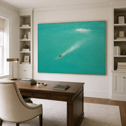 May include: A large rectangular wall art piece featuring a swimmer diving into vibrant turquoise water, creating a white splash trail. The painting is framed in a thin metallic border and is displayed on a wall above a wooden desk.