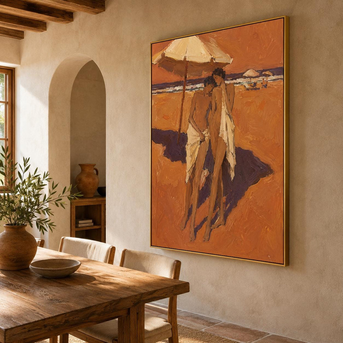 May include: A large rectangular framed painting featuring an impressionistic beach scene with two figures standing under a beige umbrella. The artwork uses a warm palette of burnt orange, deep brown, and cream tones to depict the sand and sea.