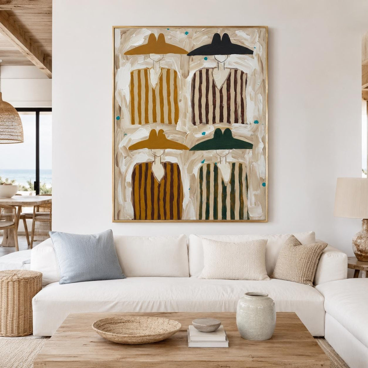 May include: A rectangular wall art piece in a gold frame featuring four stylized figures wearing wide-brimmed hats and striped tunics in shades of mustard yellow, black, brown, and dark green against a textured, neutral-toned background.
