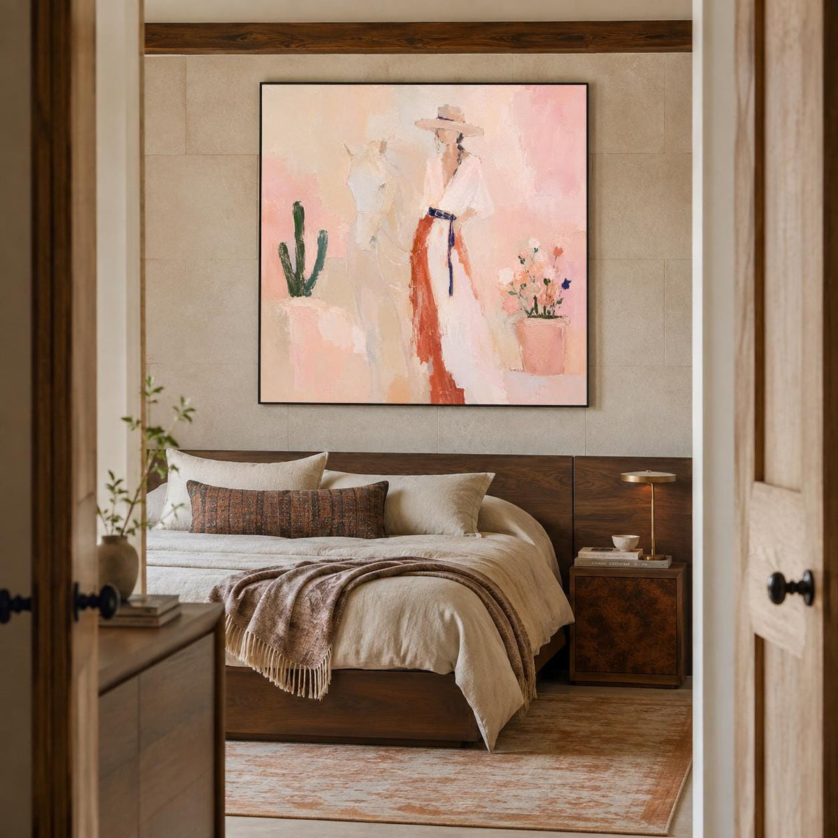 May include: A square wall art print featuring an impressionistic painting of a person wearing a wide-brimmed hat and a long dress, standing beside a horse, a cactus, and a potted flower arrangement in shades of soft pink, peach, and cream.